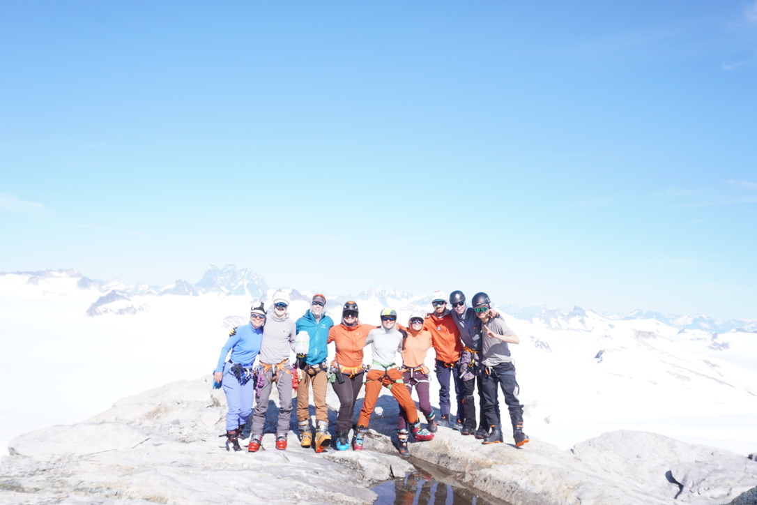 picture of a group of people on top of taku b